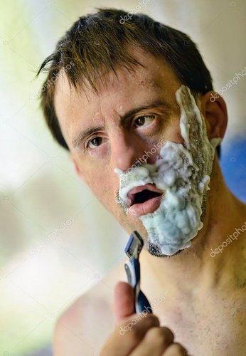 depositphotos_49390399-stock-photo-down-syndrome-man-shaving~2